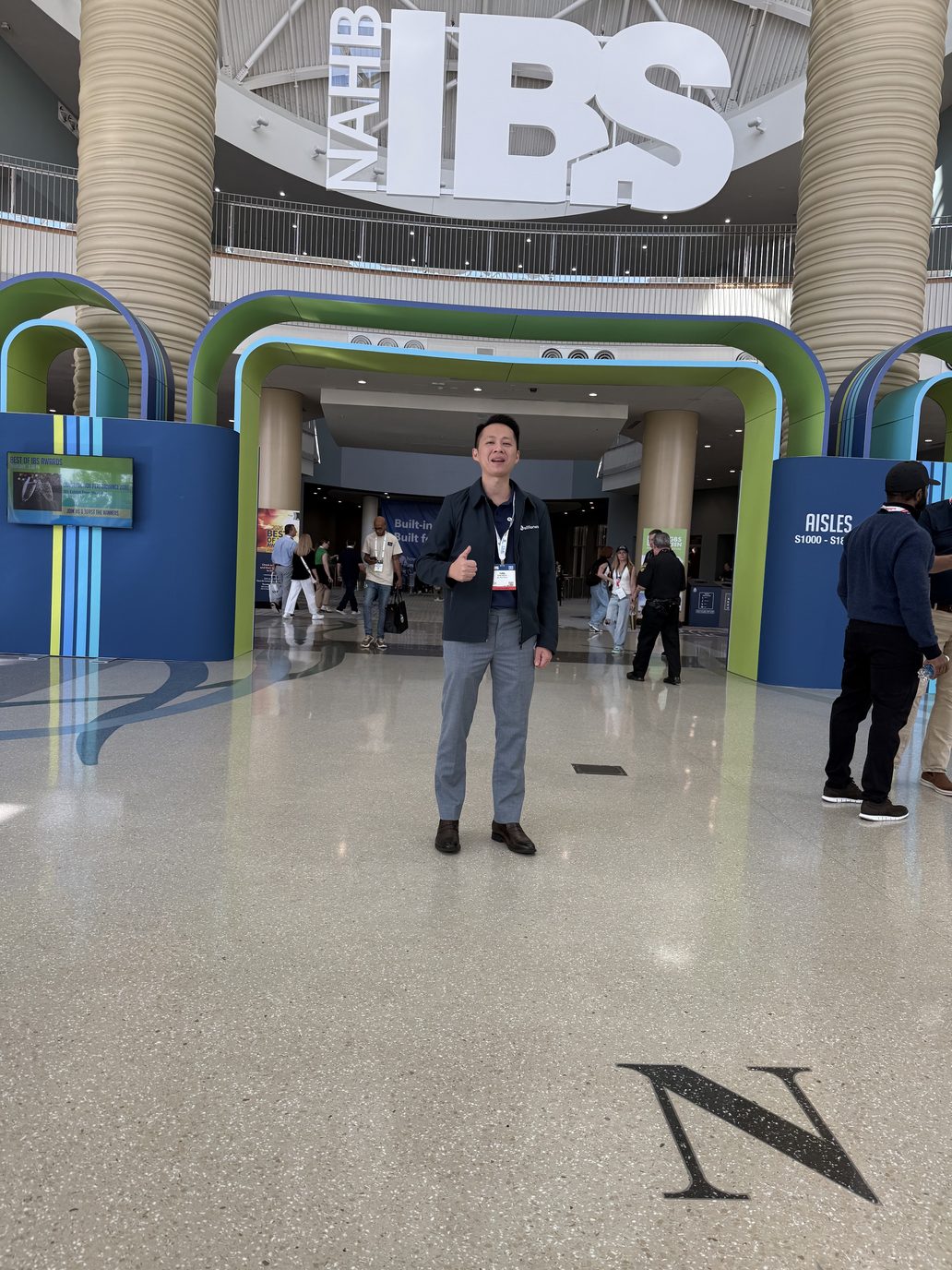A team member at the entrance of the International Builders Show