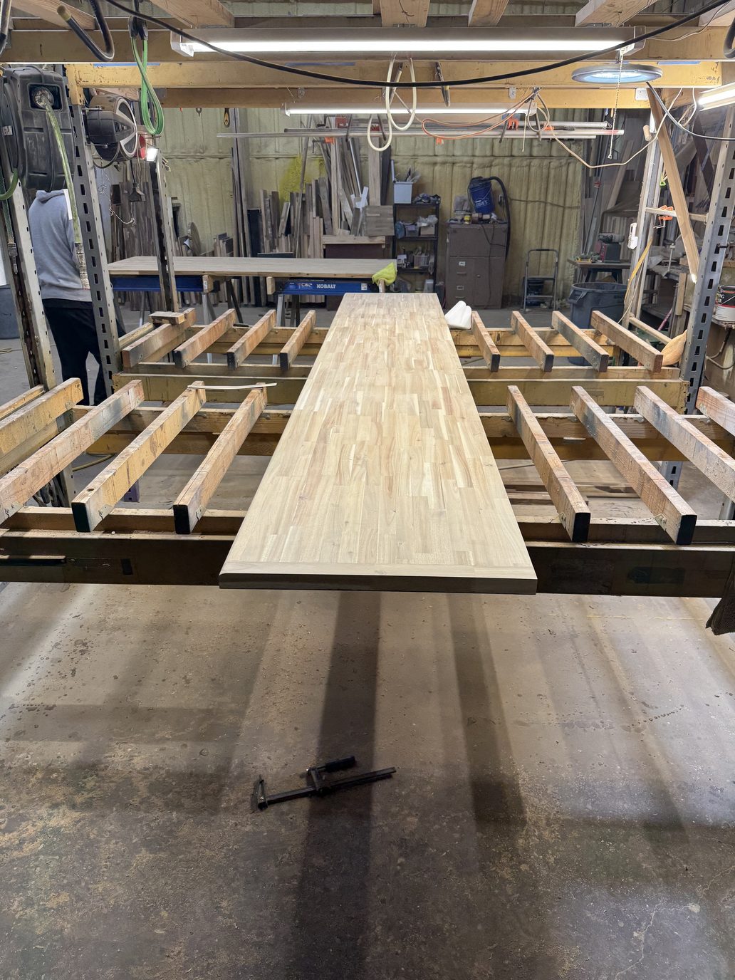 A 12-ft hevea run on a rack in a dealer workshop