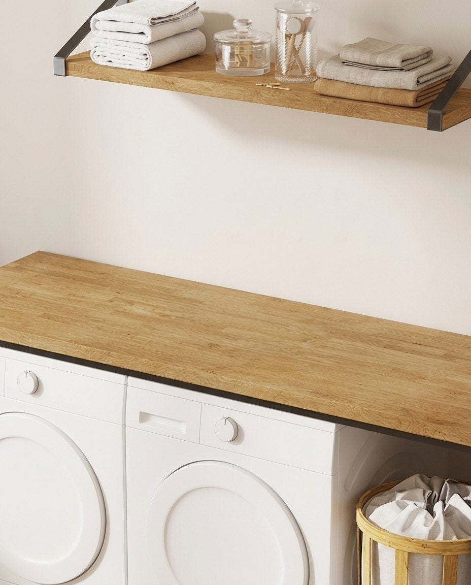 A laundry room with a wood top over the machines