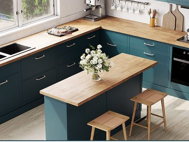 A solid wood counter run in a kitchen