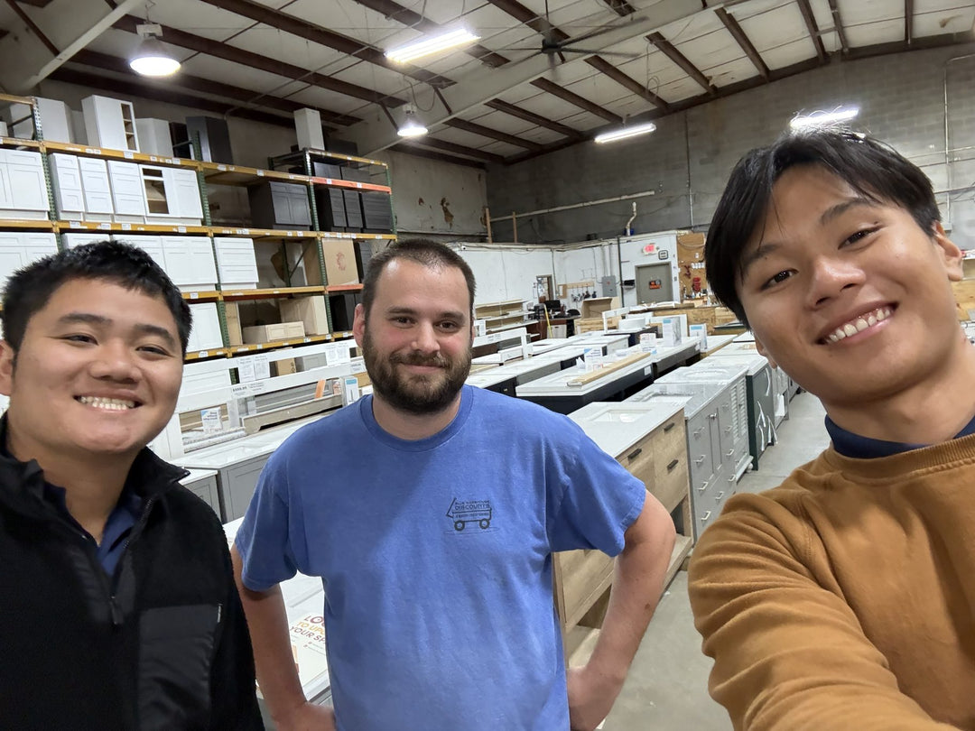 Our team with a customer at their cabinet and vanity warehouse