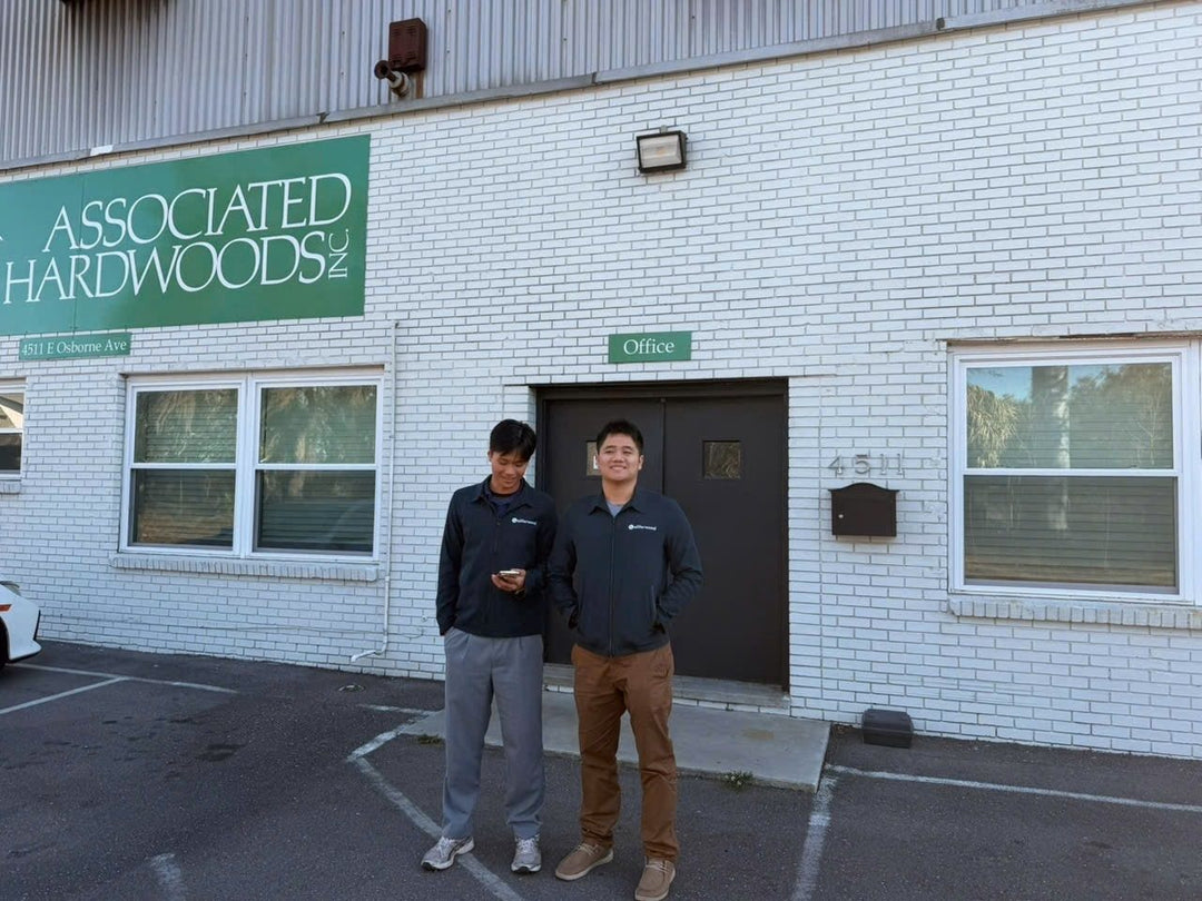 Two of our team outside a hardwood dealer&rsquo;s office on a sales visit